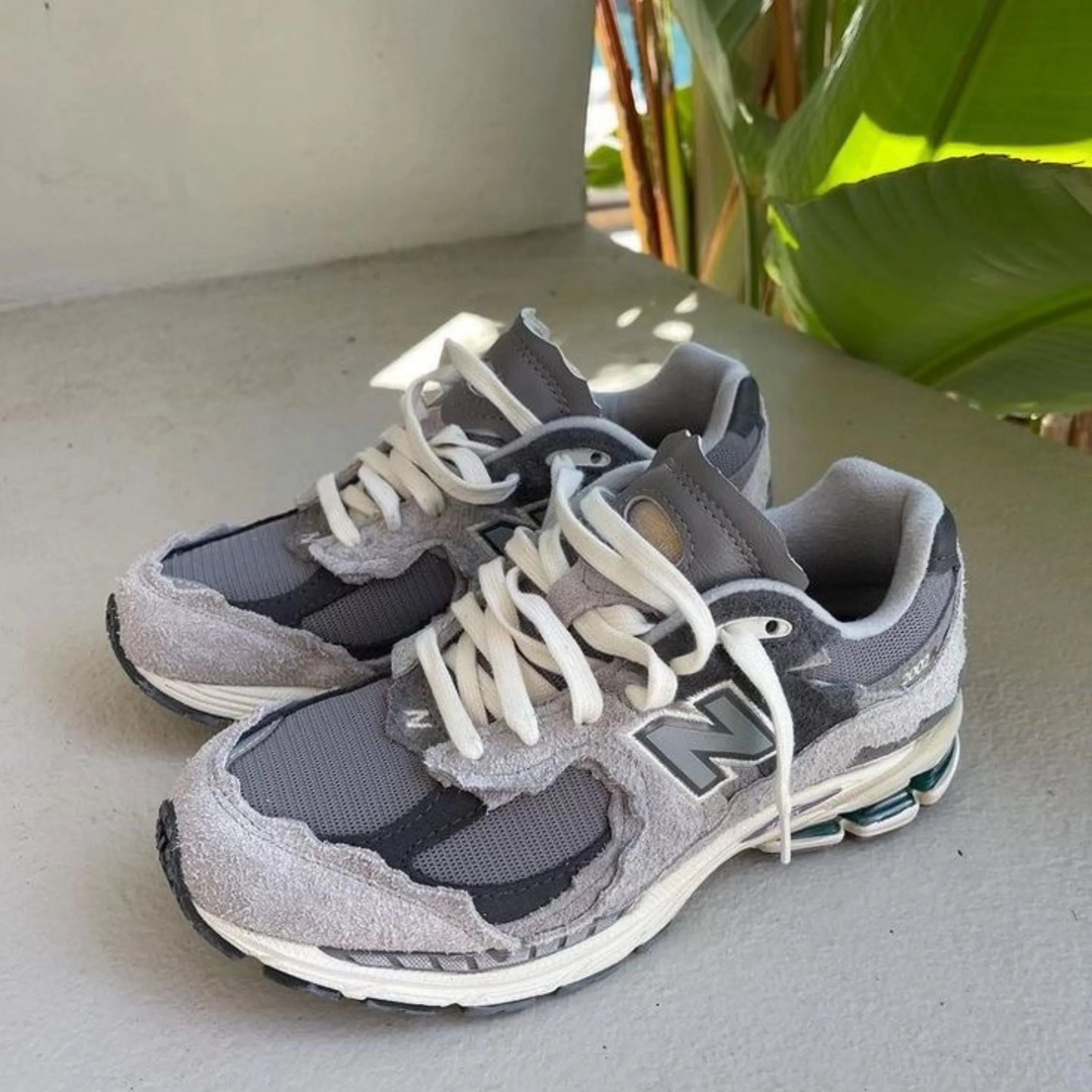 De New Balance 2002R Protection Pack "Rain Cloud": Een grijze droom